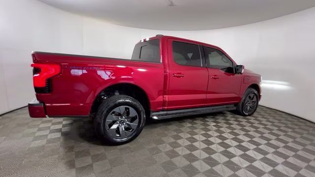 2023 Red Metallic Ford F-150 Lightning Lariat AWD Truck