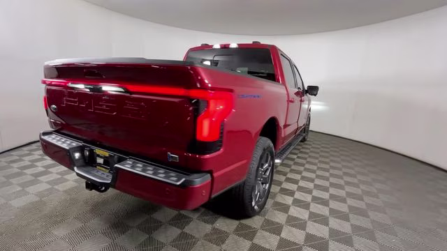 2023 Red Metallic Ford F-150 Lightning Lariat AWD Truck