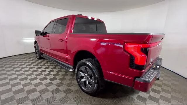 2023 Red Metallic Ford F-150 Lightning Lariat AWD Truck