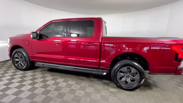 2023 Red Metallic Ford F-150 Lightning Lariat AWD Truck