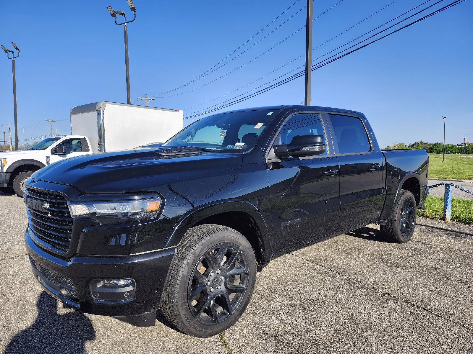 2025 Diamond Black Crystal Pearlcoat Ram 1500 Laramie 4X4 Truck