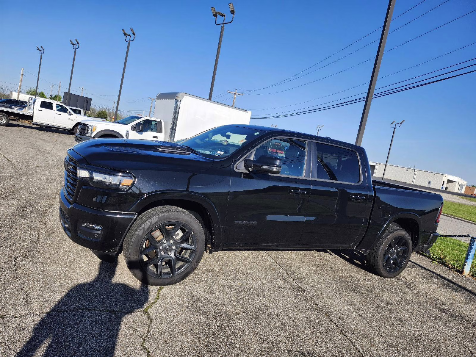 2025 Diamond Black Crystal Pearlcoat Ram 1500 Laramie 4X4 Truck