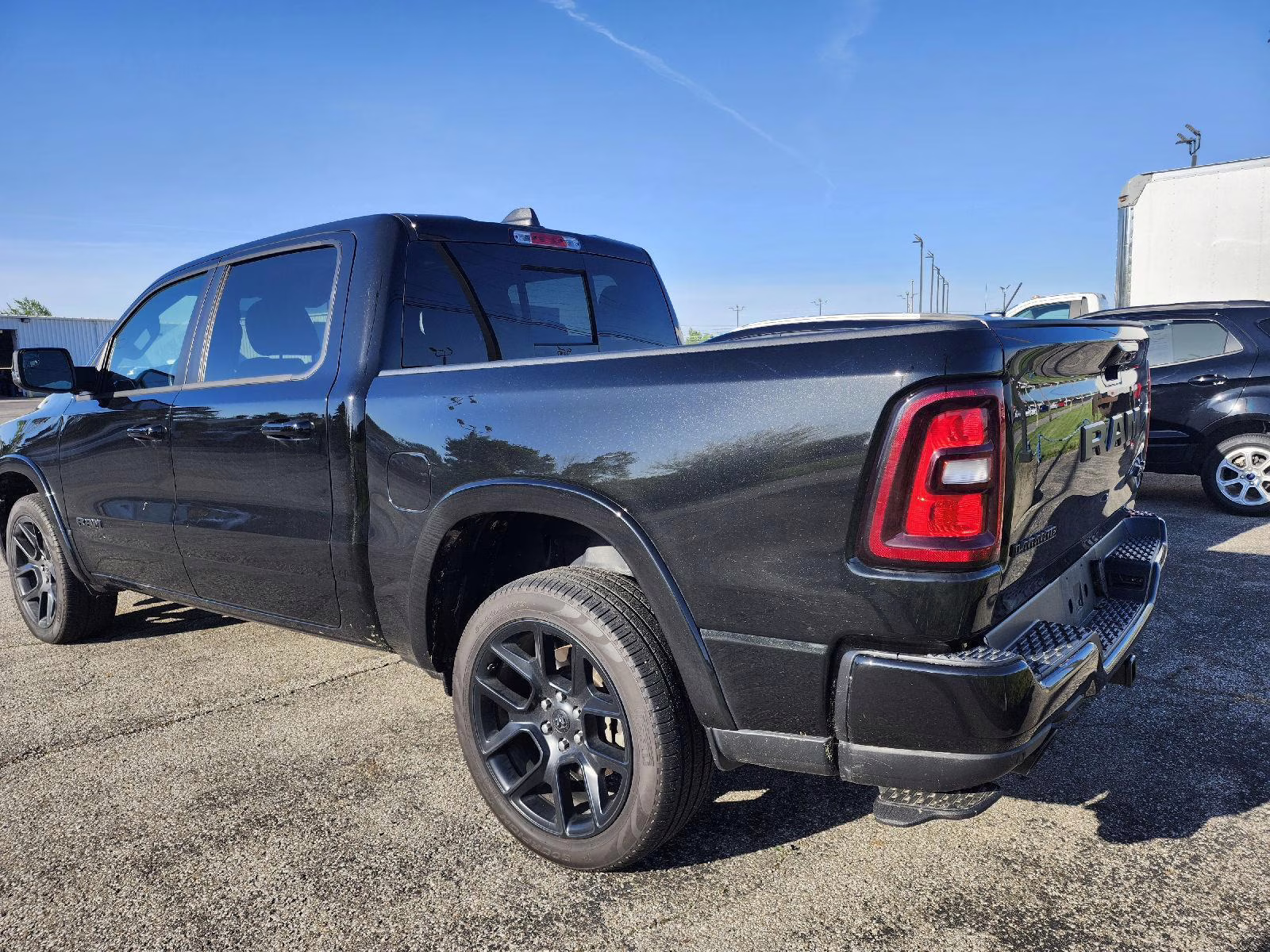 2025 Diamond Black Crystal Pearlcoat Ram 1500 Laramie 4X4 Truck