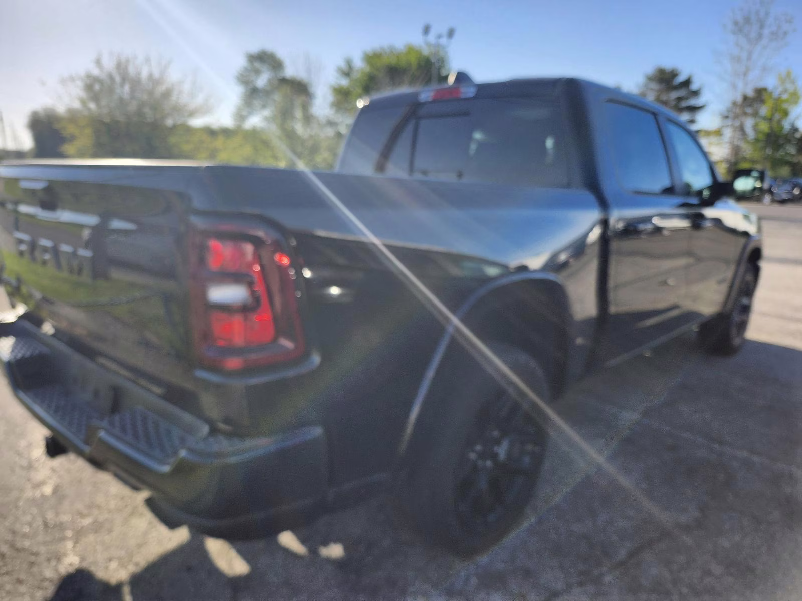 2025 Diamond Black Crystal Pearlcoat Ram 1500 Laramie 4X4 Truck