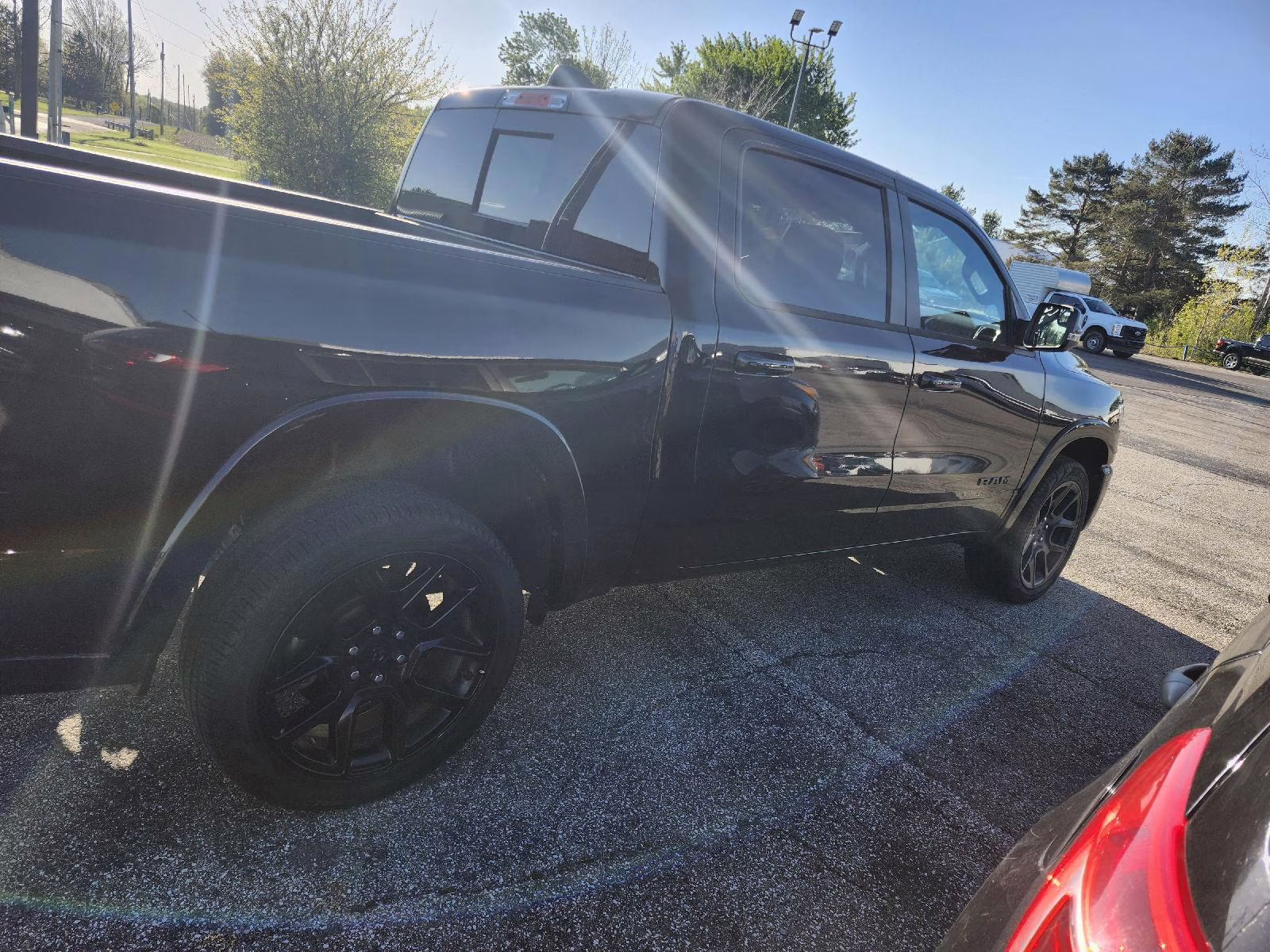 2025 Diamond Black Crystal Pearlcoat Ram 1500 Laramie 4X4 Truck