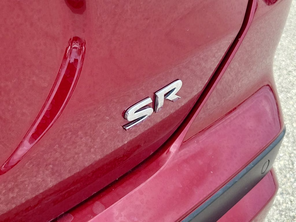 2023 Scarlet Ember Tintcoat/Super Black Nissan Kicks SR FWD SUV