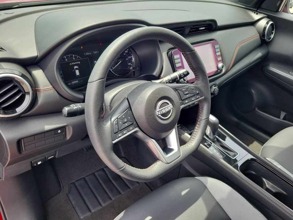 2023 Scarlet Ember Tintcoat/Super Black Nissan Kicks SR FWD SUV