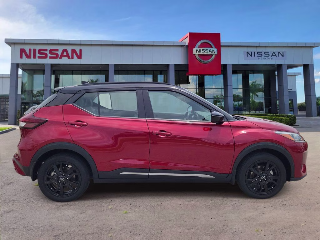 2023 Scarlet Ember Tintcoat/Super Black Nissan Kicks SR FWD SUV