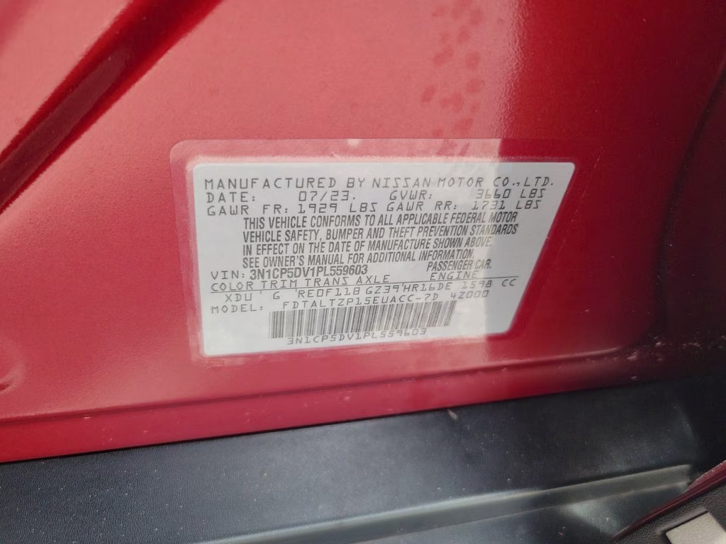 2023 Scarlet Ember Tintcoat/Super Black Nissan Kicks SR FWD SUV