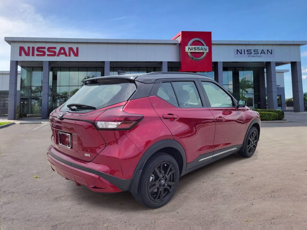 2023 Scarlet Ember Tintcoat/Super Black Nissan Kicks SR FWD SUV
