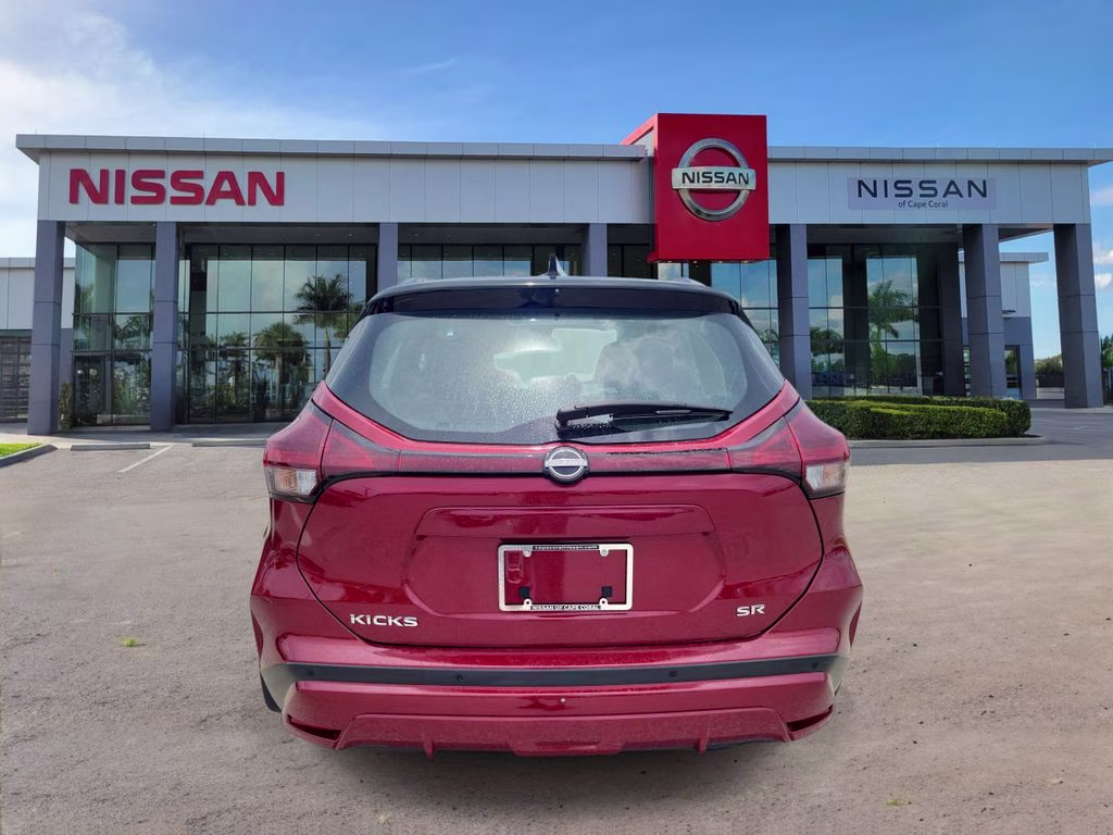 2023 Scarlet Ember Tintcoat/Super Black Nissan Kicks SR FWD SUV