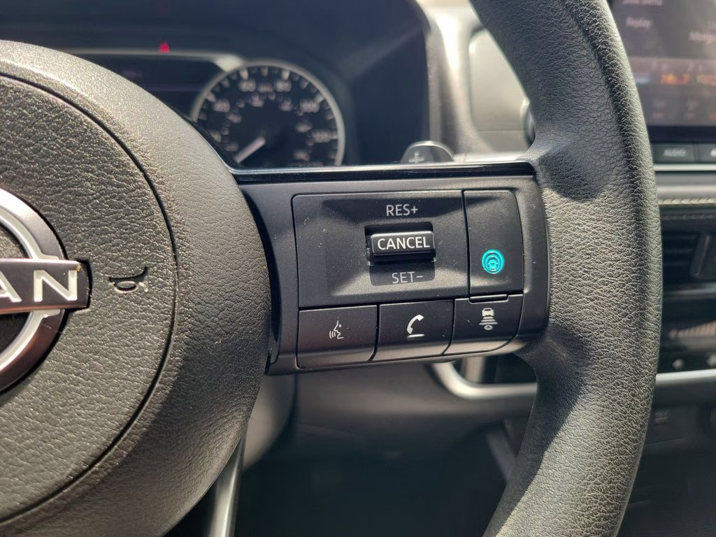 2023 Pearl White Tricoat Nissan Rogue SV FWD SUV
