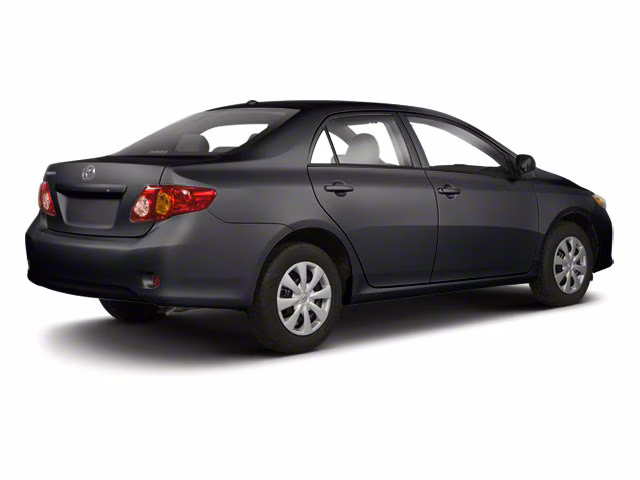 2010 Black Toyota Corolla LE FWD Sedan