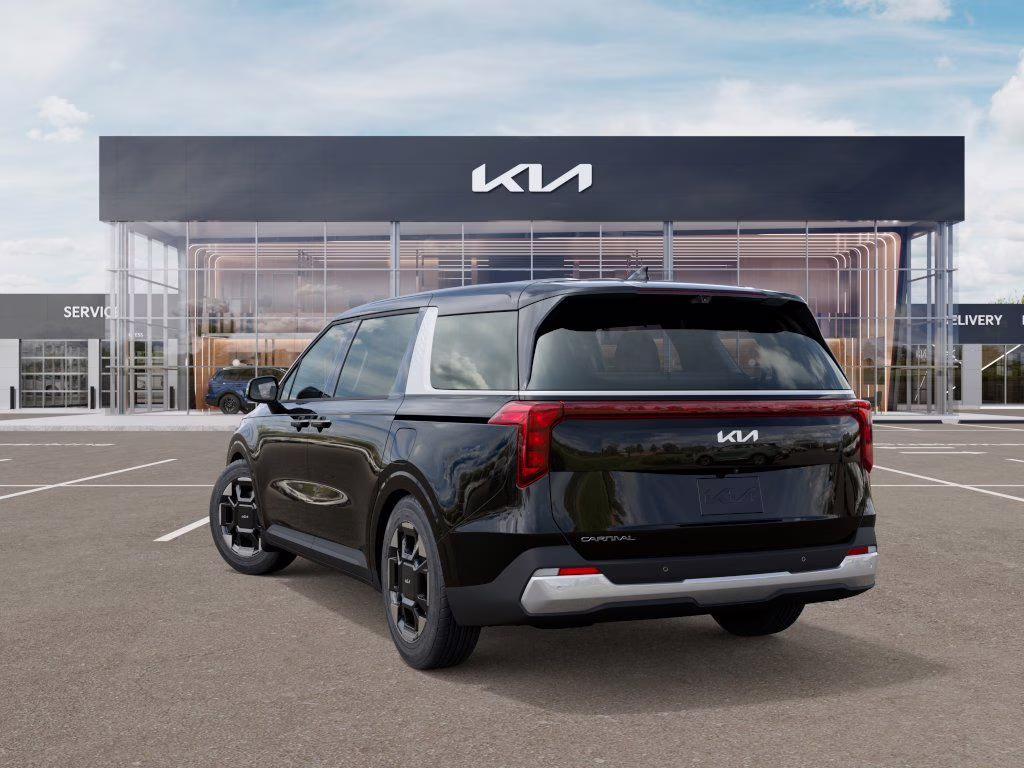 2026 Aurora Black Kia Carnival EX FWD Van