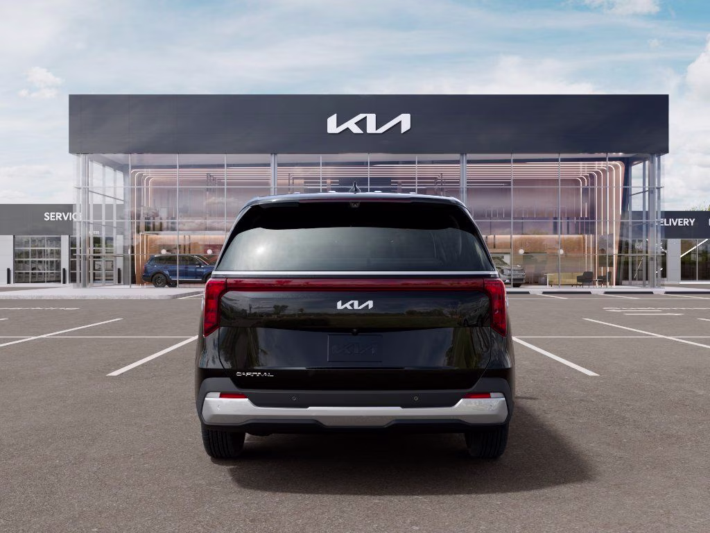 2026 Aurora Black Kia Carnival EX FWD Van