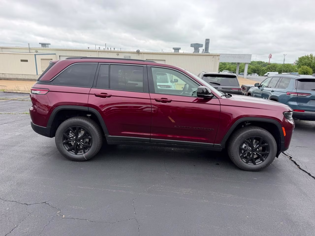 2026 Velvet Red Pearlcoat Jeep Grand Cherokee Laredo Altitude 4X4 SUV