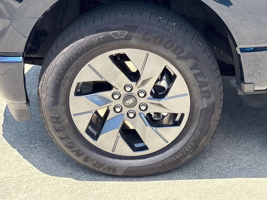 2025 Antimatter Blue Metallic Ford F-150 Lightning Lariat AWD Truck