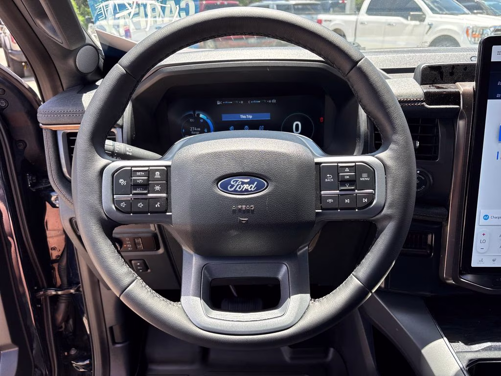 2025 Antimatter Blue Metallic Ford F-150 Lightning Lariat AWD Truck