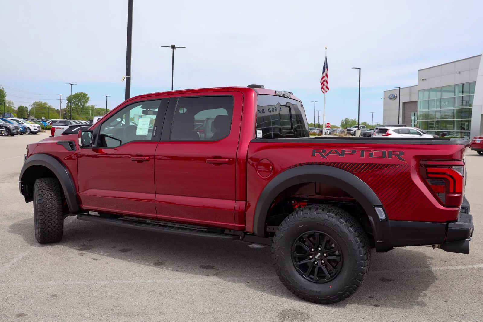 2026 Ruby Red Metallic Tinted Clearcoat Ford F-150 Raptor 4X4 Truck