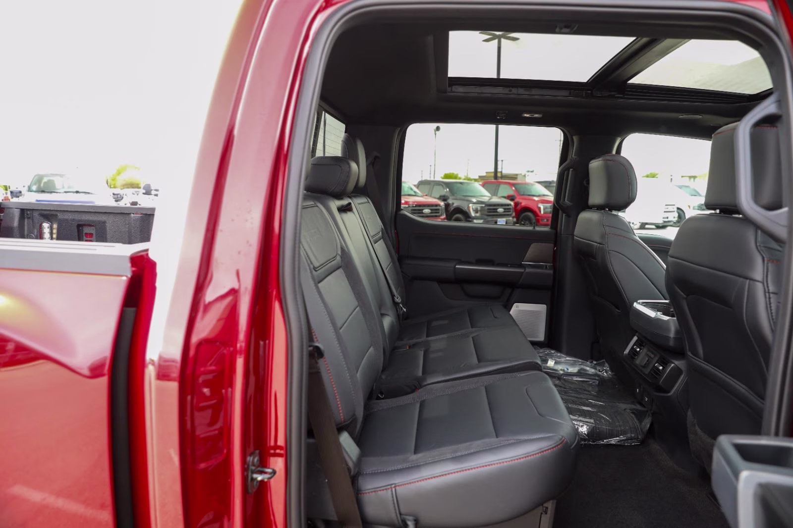 2026 Ruby Red Metallic Tinted Clearcoat Ford F-150 Raptor 4X4 Truck