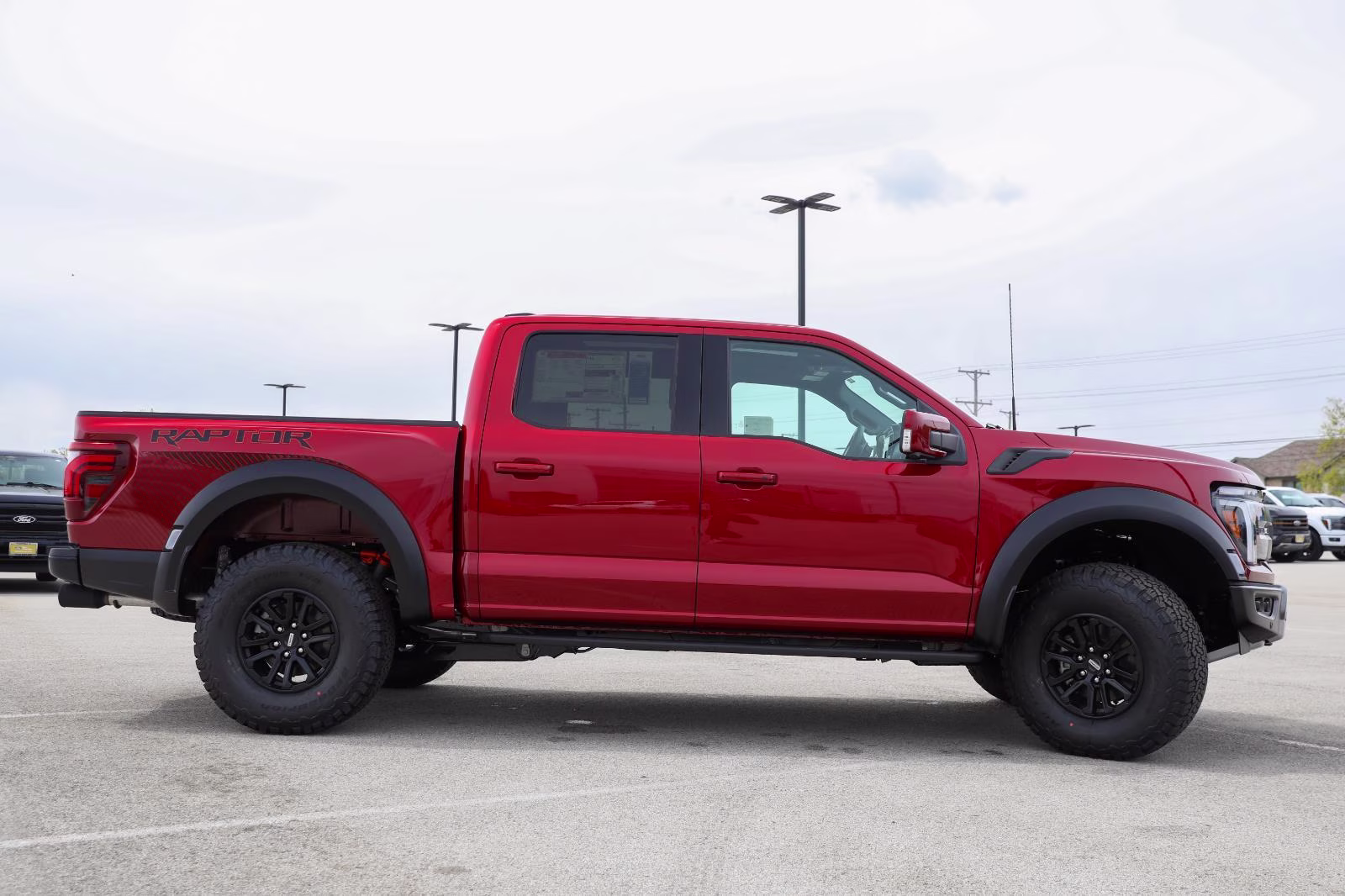 2026 Ruby Red Metallic Tinted Clearcoat Ford F-150 Raptor 4X4 Truck