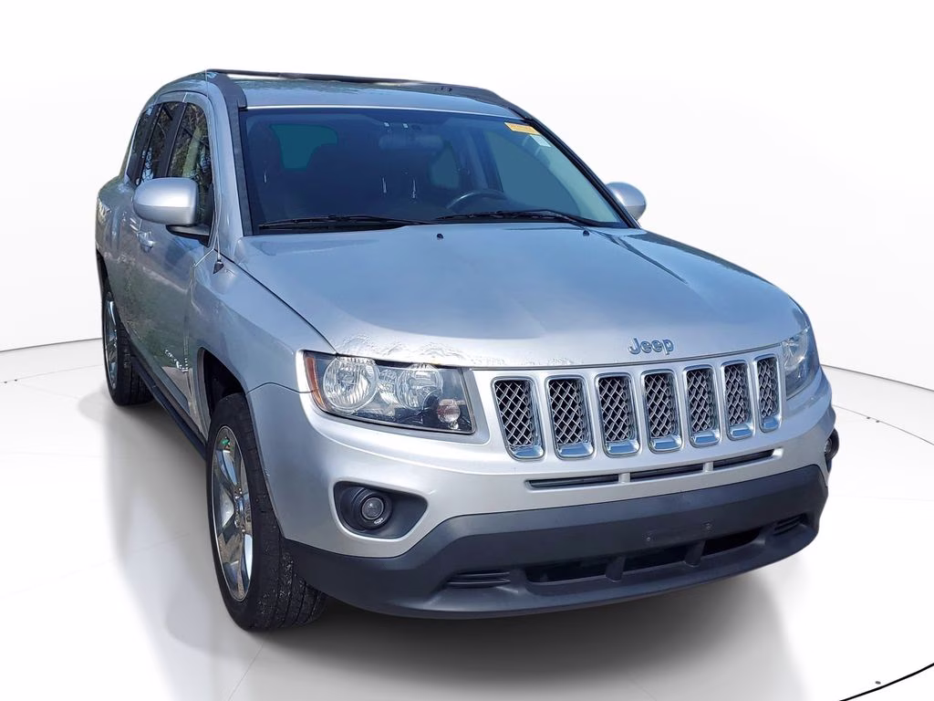 Used 2014 Jeep Compass Latitude with VIN 1C4NJDEB2ED600099 for sale in Venice, FL