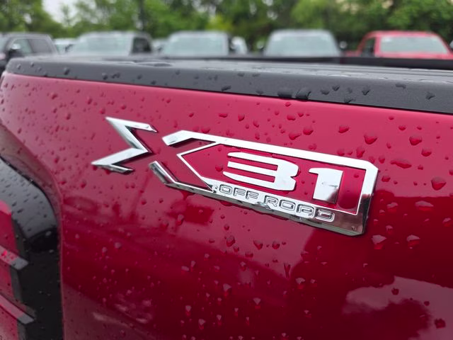 2026 Volcanic Red Tintcoat GMC Sierra 2500HD SLT 4X4 Truck