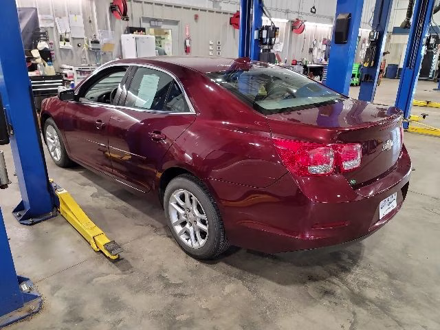 2015 Butte Red Metallic Chevrolet Malibu LT FWD Sedan