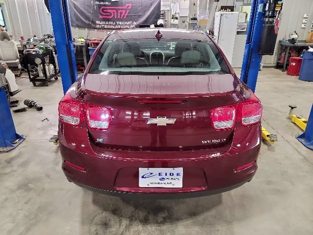 2015 Butte Red Metallic Chevrolet Malibu LT FWD Sedan