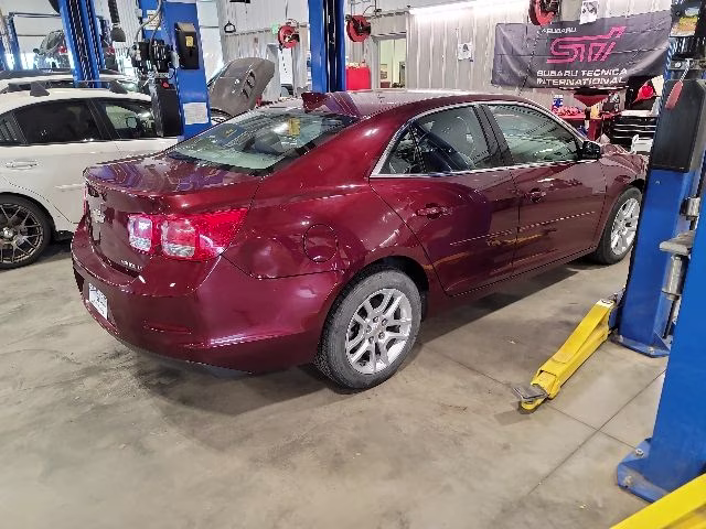 2015 Butte Red Metallic Chevrolet Malibu LT FWD Sedan