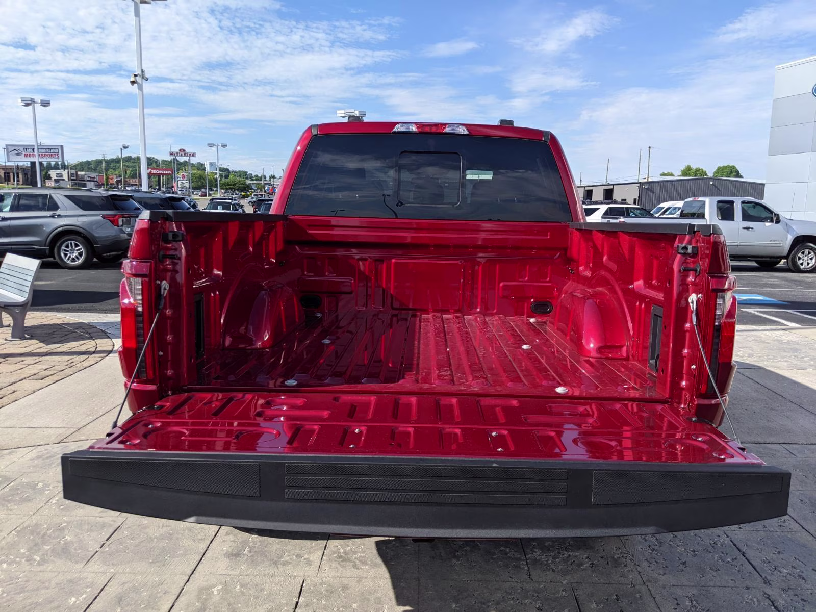 2026 Ruby Red Metallic Tinted Clearcoat Ford F-150 XLT 4X4 Truck
