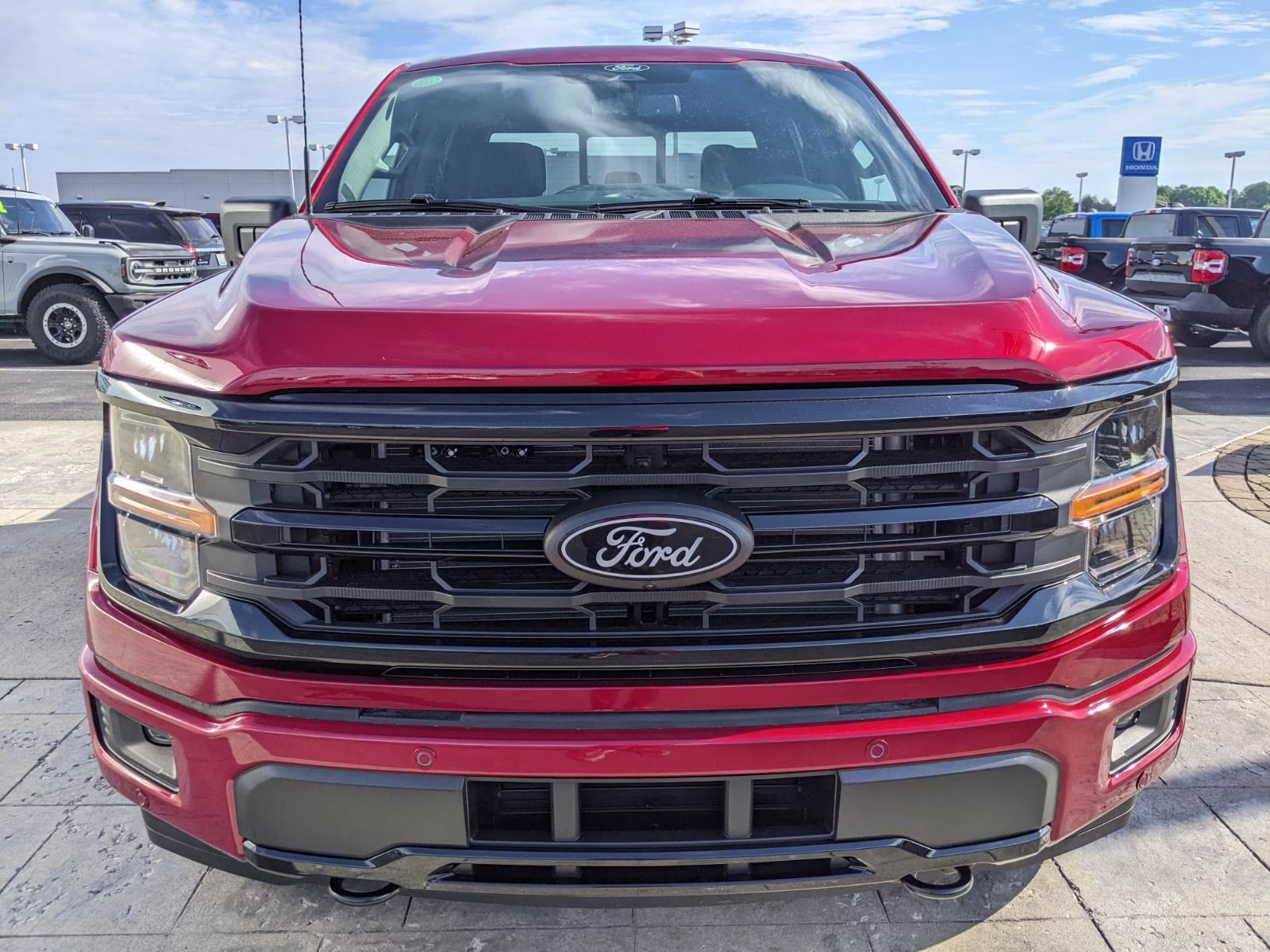 2026 Ruby Red Metallic Tinted Clearcoat Ford F-150 XLT 4X4 Truck