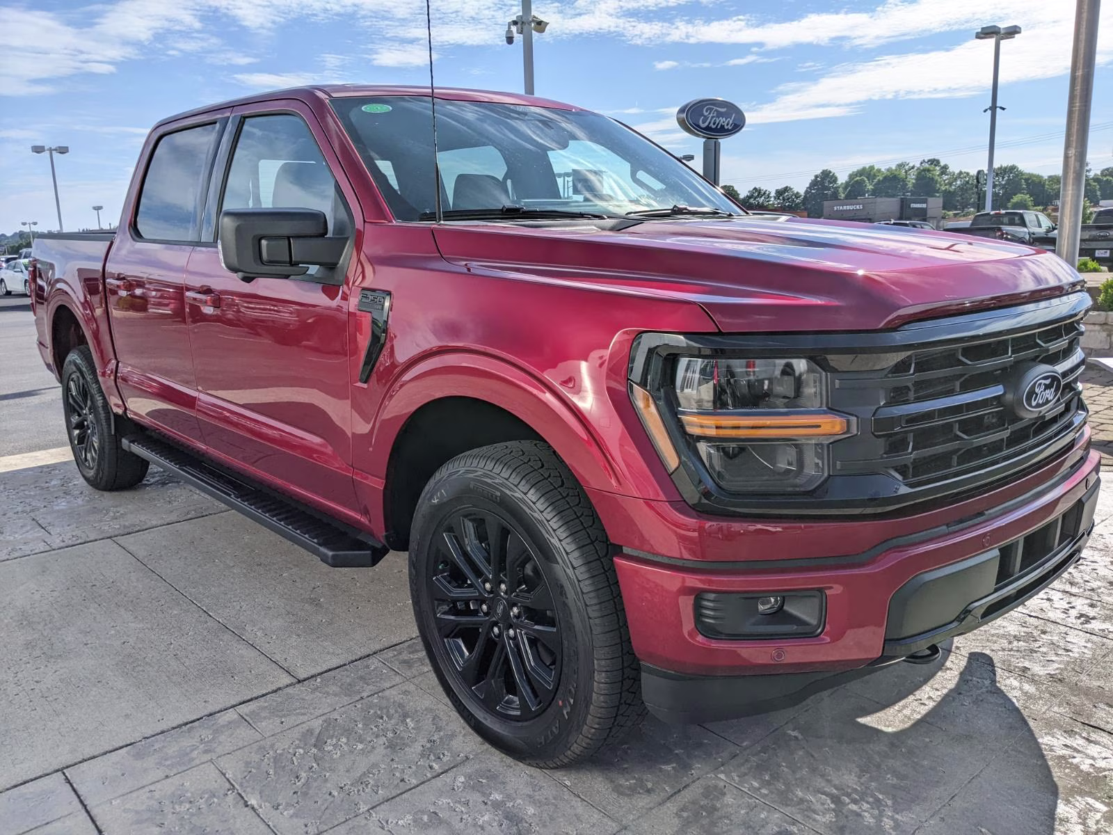 2026 Ruby Red Metallic Tinted Clearcoat Ford F-150 XLT 4X4 Truck