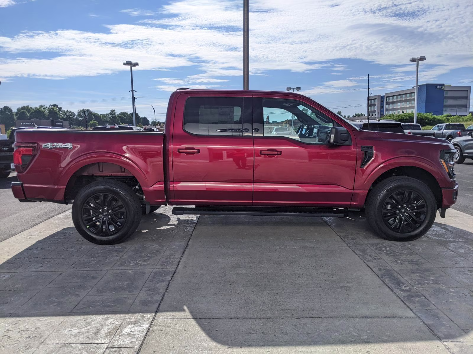 2026 Ruby Red Metallic Tinted Clearcoat Ford F-150 XLT 4X4 Truck