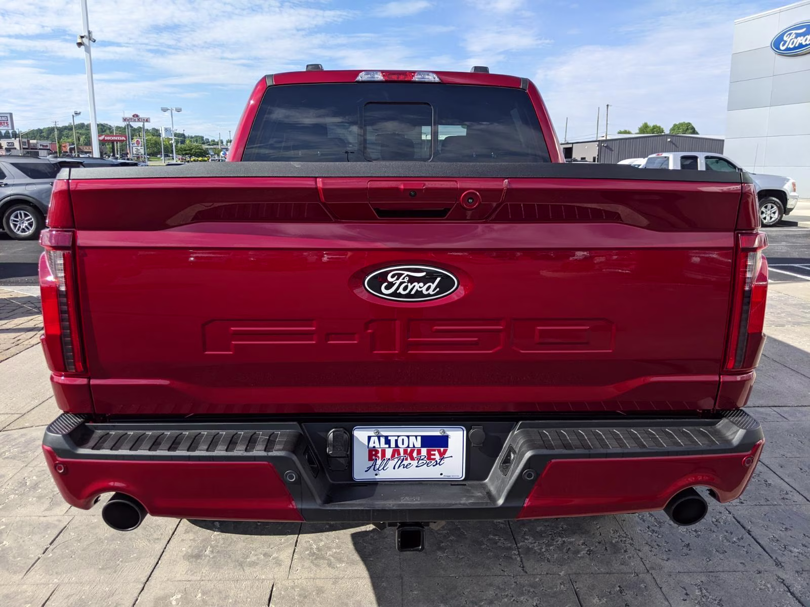 2026 Ruby Red Metallic Tinted Clearcoat Ford F-150 XLT 4X4 Truck