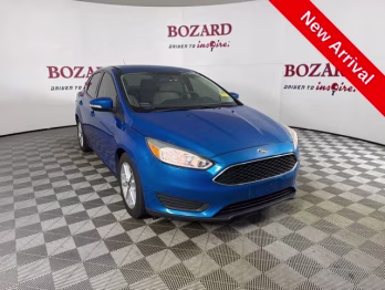 2016 Blue Candy Ford Focus SE FWD Sedan