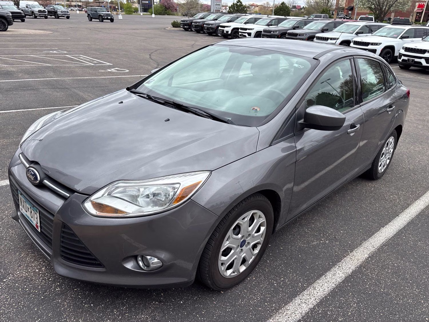 Used 2012 Ford Focus SE with VIN 1FAHP3F21CL424451 for sale in Stillwater, Minnesota
