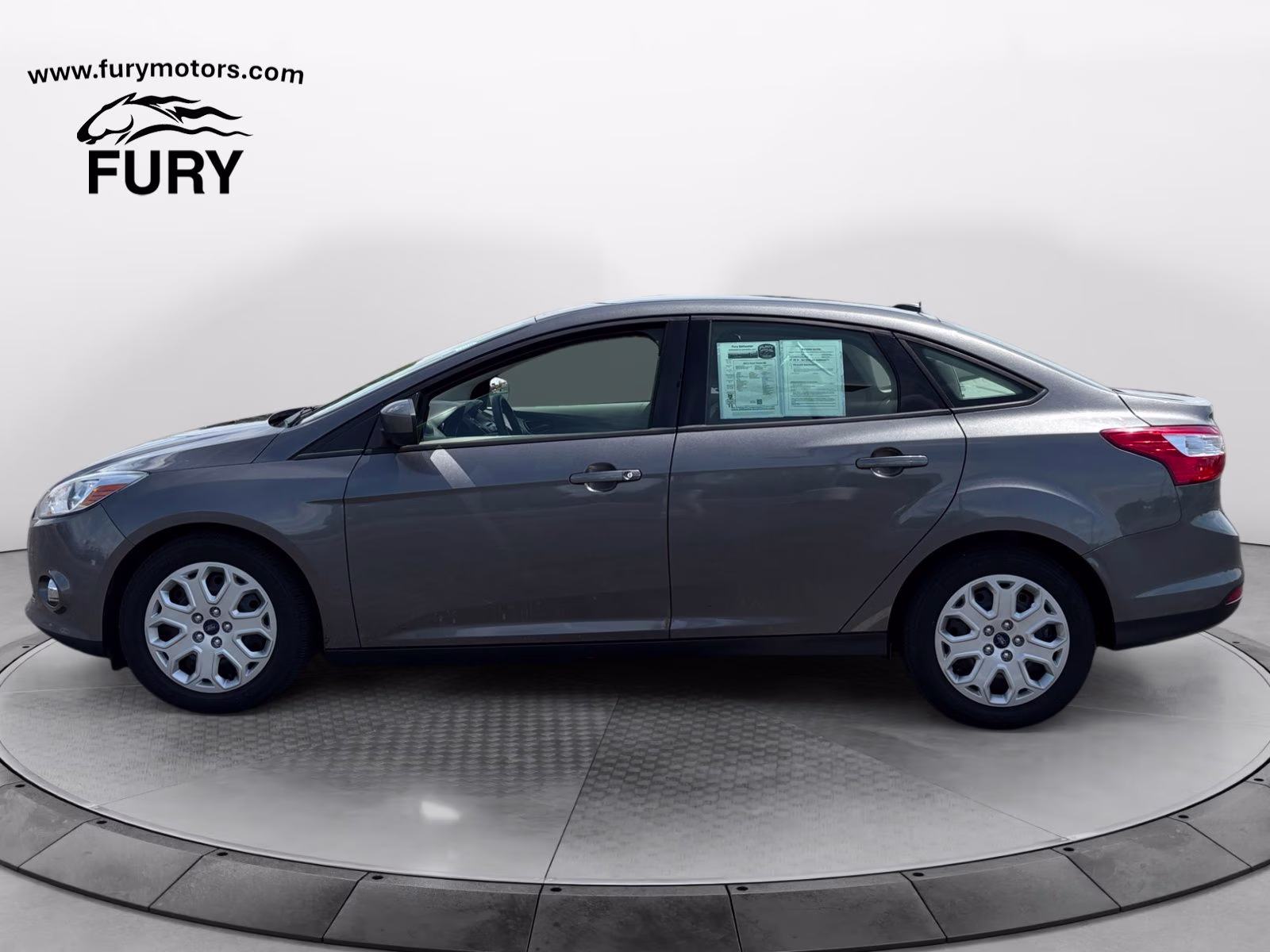 2012 Sterling Gray Metallic Ford Focus SE FWD Sedan