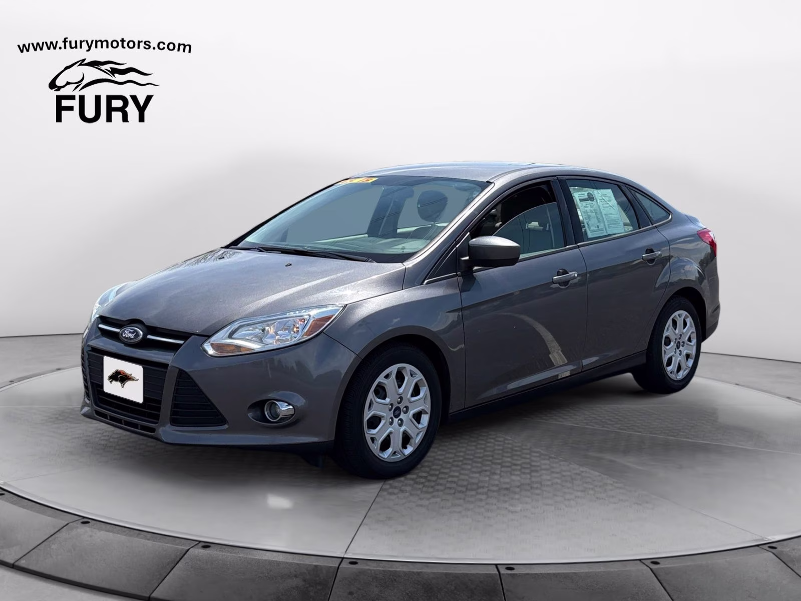 2012 Sterling Gray Metallic Ford Focus SE FWD Sedan