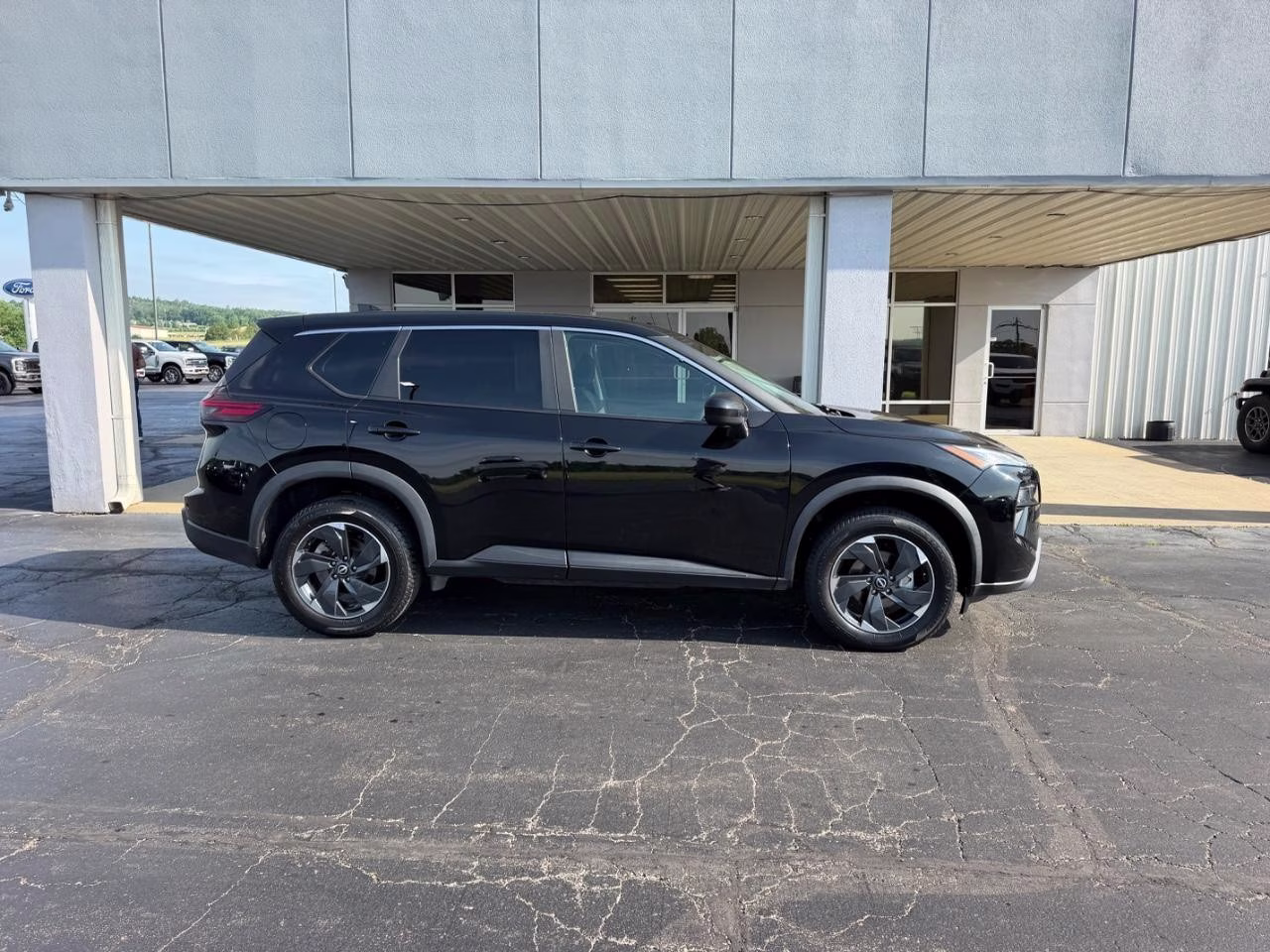 2024 Super Black Nissan Rogue SV AWD SUV