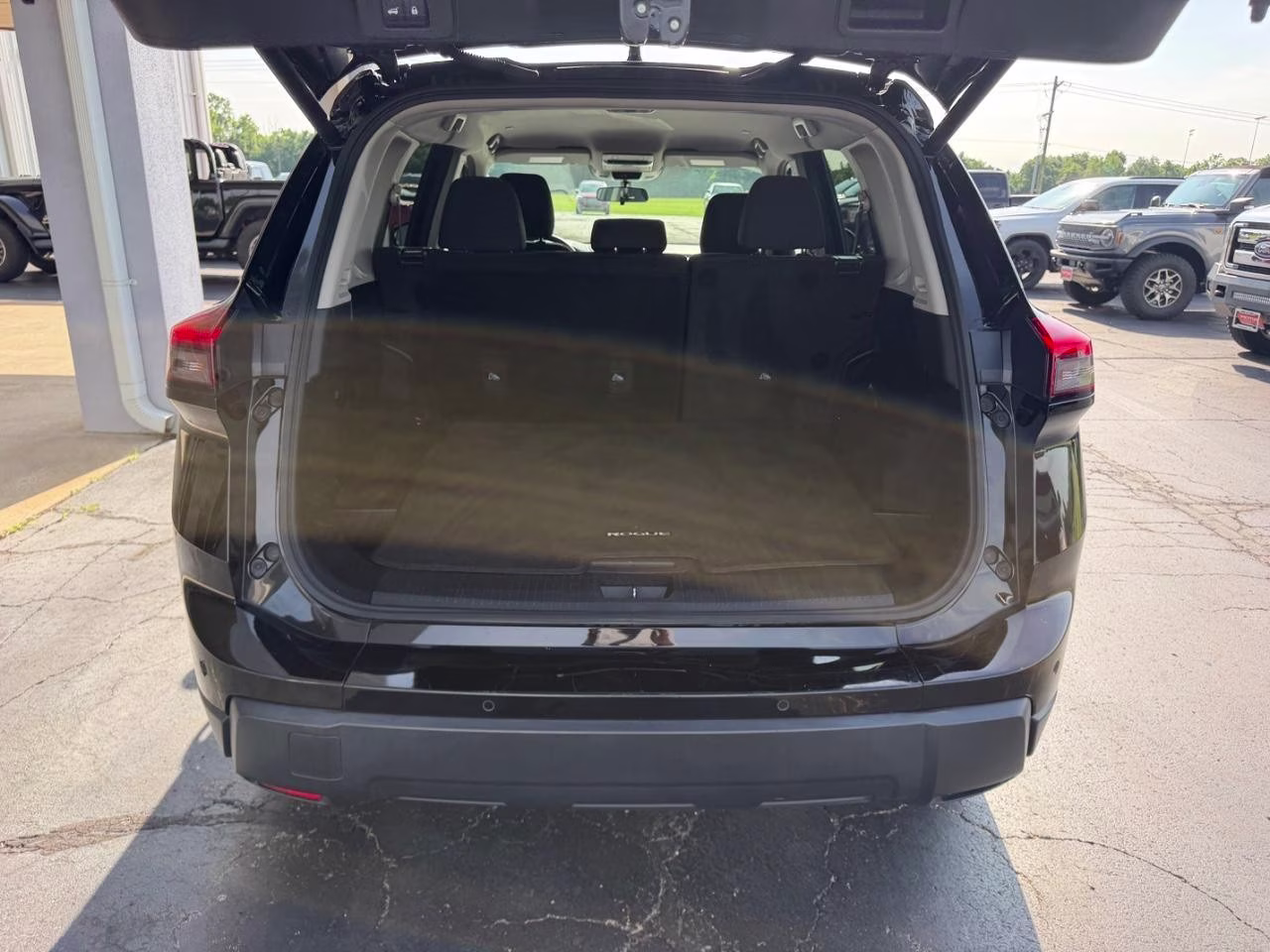 2024 Super Black Nissan Rogue SV AWD SUV