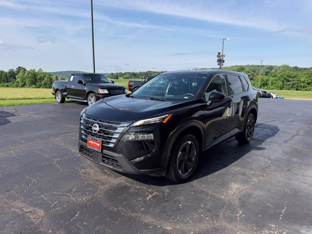2024 Super Black Nissan Rogue SV AWD SUV