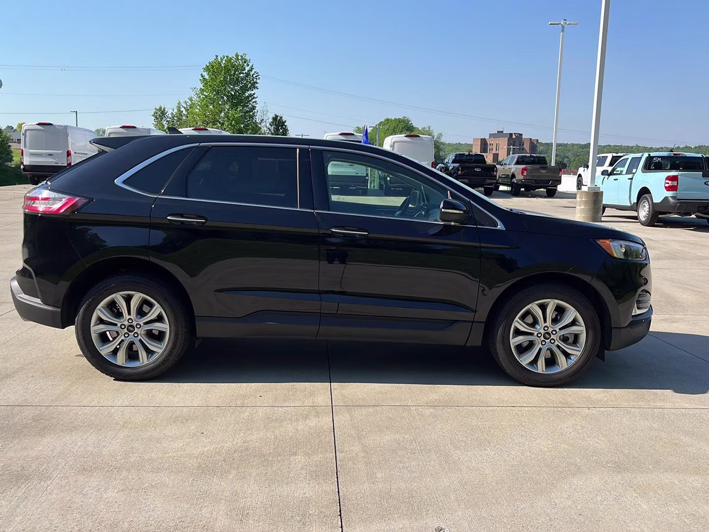 2024 Agate Black Ford Edge Titanium AWD SUV