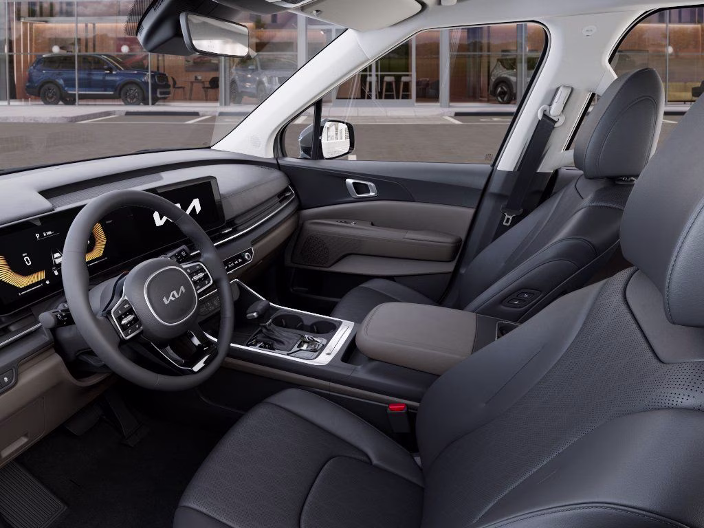 2026 Ceramic Silver Kia Carnival EX FWD Van