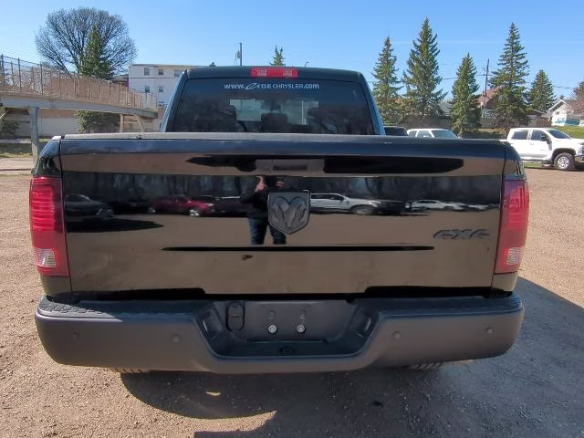 2023 Diamond Black Crystal Pearlcoat Ram 1500 Classic Warlock 4X4 Truck