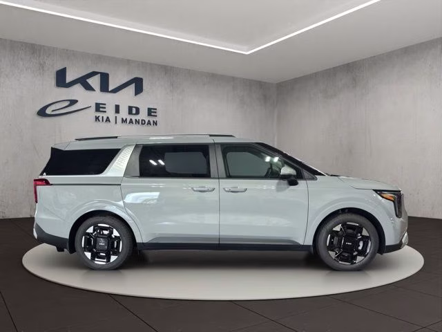 2026 Ceramic Silver Kia Carnival EX FWD Van