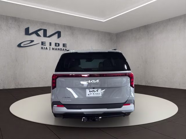 2026 Ceramic Silver Kia Carnival EX FWD Van