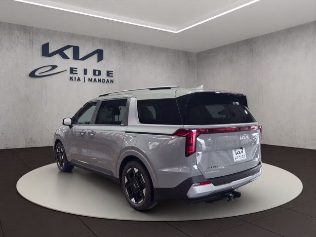 2026 Ceramic Silver Kia Carnival EX FWD Van