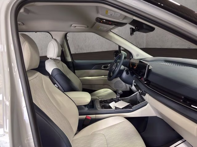 2026 Ceramic Silver Kia Carnival EX FWD Van