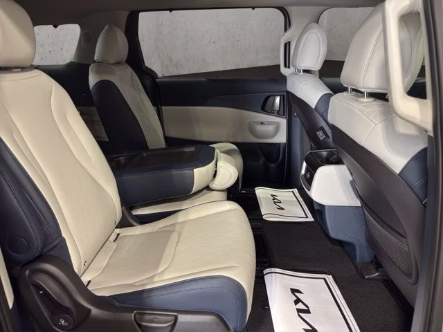 2026 Ceramic Silver Kia Carnival EX FWD Van